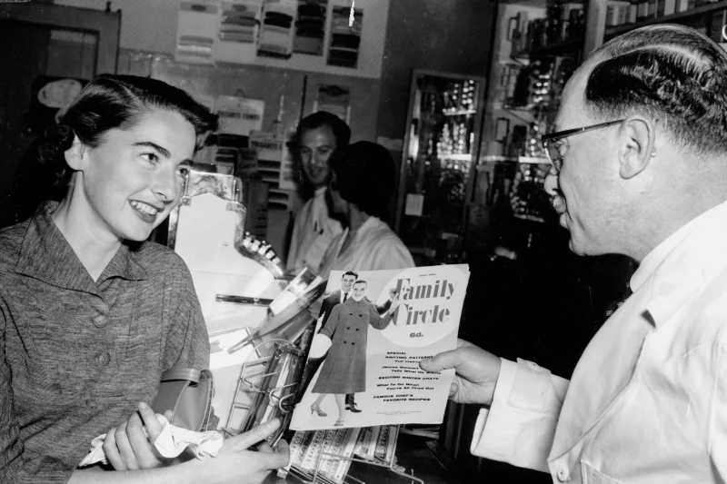 Harold Michael serving a customer